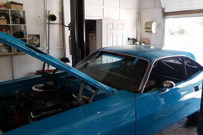 Professional windshield replacement and custom auto glass installation for a classic muscle car, ensuring proper fit, appearance, and vehicle preservation.