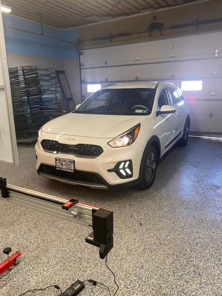Clear Vision Auto Glass rep handling insurance claim during mobile repair in Chadds Ford